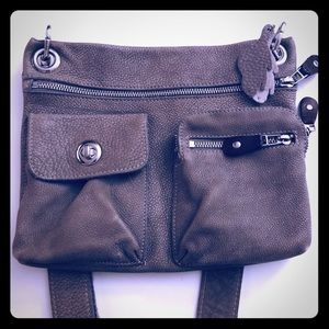 authentic roots leather village bag